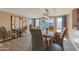 Elegant dining room with modern lighting and backyard views at 1749 E Medlock Dr, Phoenix, AZ 85016