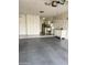 Spacious garage with ample storage cabinets, utility sink, and workspace at 17841 N Del Webb Blvd, Sun City, AZ 85373