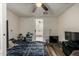 Bedroom with view to kitchen and ceiling fan at 253 N Fraser Dr, Mesa, AZ 85203