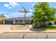 Beautiful single-story home with mature landscaping and a two-car garage at 253 N Fraser Dr, Mesa, AZ 85203