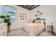 Inviting bedroom with cute accents and a cozy bed, creating a cheerful and relaxing space at 2877 E Lucky Horseshoe Ln, San Tan Valley, AZ 85140