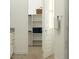 Bathroom featuring closet with open shelving for storage and organization at 2897 E Lucky Horseshoe Ln, San Tan Valley, AZ 85140