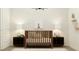 Charming Bedroom design featuring a wooden crib, bedside tables, and a comforting bunny wall art at 2897 E Lucky Horseshoe Ln, San Tan Valley, AZ 85140