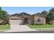 Beautiful single-story home with a two-car garage and well-maintained landscaping at 2897 E Lucky Horseshoe Ln, San Tan Valley, AZ 85140