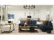 Spacious living room with modern furnishings and an open concept design at 2897 E Lucky Horseshoe Ln, San Tan Valley, AZ 85140