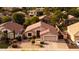 Well-maintained single-Gathering home featuring desert landscaping and a two-car garage at 300 W Cardinal Way, Chandler, AZ 85286