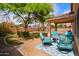 Inviting backyard patio with comfortable seating, perfect for outdoor relaxation at 300 W Cardinal Way, Chandler, AZ 85286