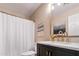 Well-lit bathroom featuring a single sink, marble countertop, and stylish fixtures at 300 W Cardinal Way, Chandler, AZ 85286