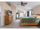 Expansive main bedroom with a ceiling fan and an abundance of natural light at 300 W Cardinal Way, Chandler, AZ 85286