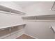 Walk-in closet featuring multiple shelves for optimal storage and organization at 300 W Cardinal Way, Chandler, AZ 85286