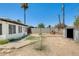 Wide backyard view featuring brick pavers, a grill, and a convenient storage shed at 3001 N 21St Ave, Phoenix, AZ 85015