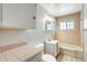 Cozy bathroom with tile accents featuring a shower-tub combo and vanity at 3001 N 21St Ave, Phoenix, AZ 85015