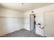 Bright bedroom featuring neutral walls, built-in shelving, and access to the hallway at 3001 N 21St Ave, Phoenix, AZ 85015