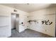 Spacious bedroom with neutral walls, art accents and shelving for flexible living at 3001 N 21St Ave, Phoenix, AZ 85015
