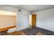 Bedroom featuring light blue walls, wooden closet and easy access to other rooms at 3001 N 21St Ave, Phoenix, AZ 85015
