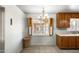 Cozy dining area featuring a chandelier and a large window with shutters at 3001 N 21St Ave, Phoenix, AZ 85015