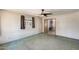 Clean and inviting living room with large window and ceiling fan at 3001 N 21St Ave, Phoenix, AZ 85015