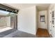 Enclosed patio featuring concrete and tile flooring, block wall, and access to back entrance at 3001 N 21St Ave, Phoenix, AZ 85015