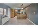 Modern kitchen featuring sleek cabinetry, a breakfast bar, and an open design for easy entertaining at 3009 W Christy Dr, Phoenix, AZ 85029
