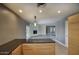 Open-concept kitchen with dark countertops and view into the living area at 3009 W Christy Dr, Phoenix, AZ 85029