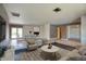 Open-concept living space with a cozy seating area, dining table, and modern finishes for a seamless flow at 3009 W Christy Dr, Phoenix, AZ 85029