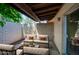 Charming outdoor patio featuring comfortable seating, a shaded area, and a private setting for relaxation at 3009 W Christy Dr, Phoenix, AZ 85029