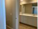Bathroom featuring dual sinks, ample counter space, and modern fixtures for comfortable living at 31878 N Bandit Rd, San Tan Valley, AZ 85143
