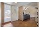 Inviting entryway with tiled flooring and a storm door leading to the spacious living area at 4556 W Cholla St, Glendale, AZ 85304