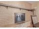 The fireplace has a brick surround and is complete with a mantle and hearth at 4556 W Cholla St, Glendale, AZ 85304