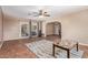 Spacious living area featuring tile flooring, sliding glass doors, and flexible layout options at 4556 W Cholla St, Glendale, AZ 85304