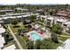 Aerial view of community pool, landscaped grounds and well-maintained buildings at 4610 N 68Th St # 411, Scottsdale, AZ 85251