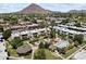 Birds-eye view of condo community featuring mature landscaping, a pool, and a central gazebo amenity at 4610 N 68Th St # 411, Scottsdale, AZ 85251