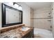 Bathroom featuring marble countertop, modern sink and fixtures, a tub and shower at 4610 N 68Th St # 411, Scottsdale, AZ 85251