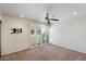 Bright bedroom with ceiling fan and sliding glass door provides plenty of natural light at 4610 N 68Th St # 411, Scottsdale, AZ 85251