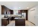 Modern kitchen features stainless steel appliances, granite countertops, and ample cabinet space at 4610 N 68Th St # 411, Scottsdale, AZ 85251