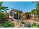 Backyard featuring a gazebo, bird house, and lush greenery, creating a welcoming outdoor living space at 4629 N 9Th St, Phoenix, AZ 85014