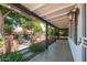Spacious covered patio with views of the garden, perfect for outdoor relaxing at 4629 N 9Th St, Phoenix, AZ 85014