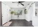 Inviting living room displays a ceiling fan, large windows and an access door to the outdoors at 4629 N 9Th St, Phoenix, AZ 85014
