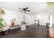 Spacious living room with an open layout, tile floors, and ceiling fan at 4629 N 9Th St, Phoenix, AZ 85014