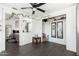 Spacious living room shows an open closet, ceiling fan, and entryway to the bedroom at 4629 N 9Th St, Phoenix, AZ 85014