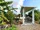 Outdoor seating area with patio cover, chairs, and beautiful backyard at 4629 N 9Th St, Phoenix, AZ 85014
