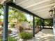 Enjoy the outdoor space with a covered patio, stone pavers, and lush landscaping at 4629 N 9Th St, Phoenix, AZ 85014
