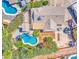 This aerial view showcases a home with two pools and lush landscaped outdoor living space at 5119 N 87Th St, Scottsdale, AZ 85250