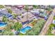 Aerial view of landscaped yard with pool, lush plantings and backyard lounge areas at 5119 N 87Th St, Scottsdale, AZ 85250