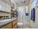 Practical bathroom featuring a shower, toilet, single sink vanity, and medicine cabinet at 5119 N 87Th St, Scottsdale, AZ 85250