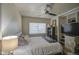 Comfortable bedroom featuring a ceiling fan, closet, carpet and neutral walls at 5119 N 87Th St, Scottsdale, AZ 85250