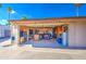 Spacious garage that has been transformed into a living space with room for a living area, TV and storage at 5119 N 87Th St, Scottsdale, AZ 85250