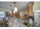 Kitchen with ample counter space, stainless appliances, pendant lights, and barstool seating at 5119 N 87Th St, Scottsdale, AZ 85250