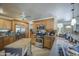 Functional kitchen with stainless steel appliances, wood cabinets, and a breakfast bar perfect for casual dining at 5119 N 87Th St, Scottsdale, AZ 85250