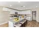 Bright kitchen boasts granite counters, stainless appliances, and ample cabinet space for all your cooking needs at 5808 S 12Th Ln, Phoenix, AZ 85041
